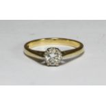 An 18ct gold ring, claw set with a solitaire RBC diamond, diamond weight approximately 0.70cts,