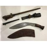 M1886 Lebel bayonet with cruciform blade and metal scabbard, together with a Nepalese Kukri knife, a