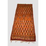 Tazenakht carpet, Morocco, circa 1940s-50s, 11ft. 8in. X 4ft. 8in. 3.56m. X 1.42m. Apricot field