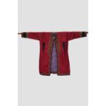 Turkmen red silk coat, Turkmenistan, second half 20th century, 28in., 71cm. Across back; 19in.,