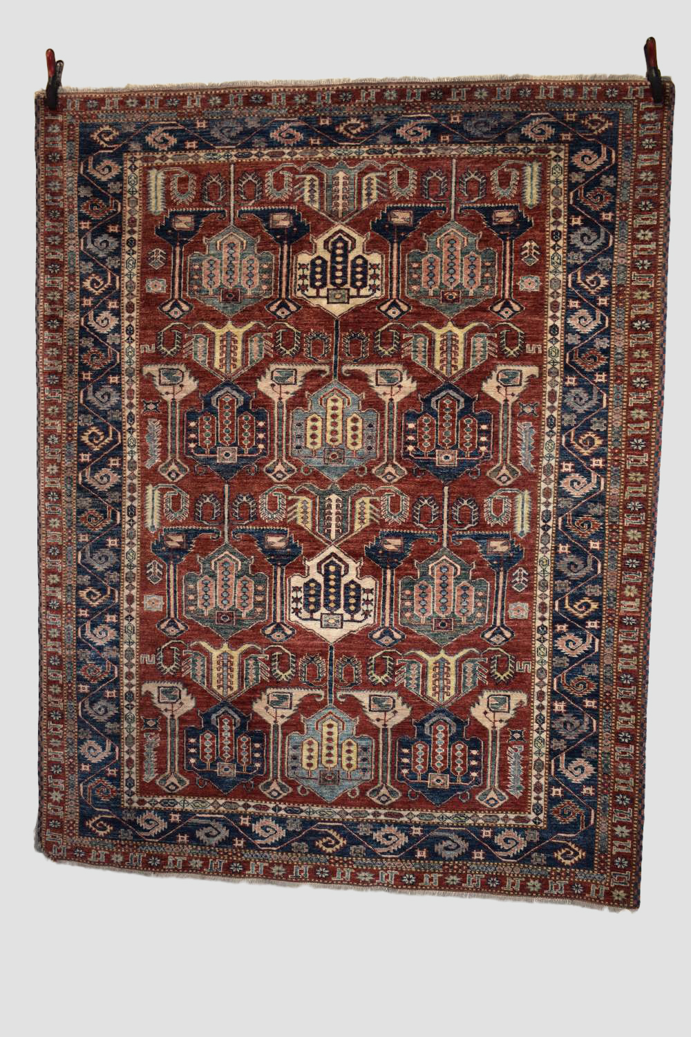 Chobi rug of Caucasian design, Afghanistan, last quarter 20th century, 7ft. 6in. X 5ft. 11in. 2.29m.