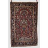 Kashan prayer rug, west Persia, circa 1930s, 6ft. 11in. X 4ft. 5in. 2.11m. X 1.35m. Soft red