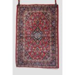 Near pair of Kashan rugs, west Persia, mid-20th century, one 5ft. X 3ft. 4in. 1.52m. X 1.02m., the