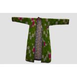 Uzbek ikat quilted coat, Uzbekistan, 20th century, 22in. 56cm. Across back; 19in. 48cm. Sleeve