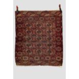 Five mixed rugs; the first, Tekke Turkmen dip khali, Turkmenistan, early 20th century, 3ft. 11in.