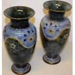 A pair of Edwardian Royal Doulton stoneware vases, decorated in moss effect, with raised beaded