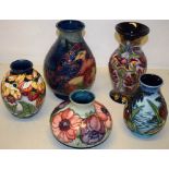 A Moorcroft vase decorated birds pecking at fruit 7.5in (19cm) a squat vase decorated anemonies