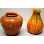 An early twentieth century Pilkingtons Royal Lancastrian orange pottery vase, with a flared neck and