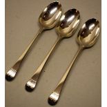 Three early George III silver Old English pattern table spoons, engraved a double headed eagle