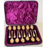 A set of twelve Victorian silver gilt berry spoons, of teaspoon size, Maker Charles Boyton, London