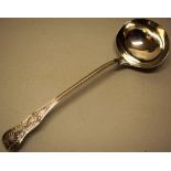A Victorian silver Kings Pattern soup ladle, engraved a crest, 13in (33cm) Makers Hunt & Roskell,
