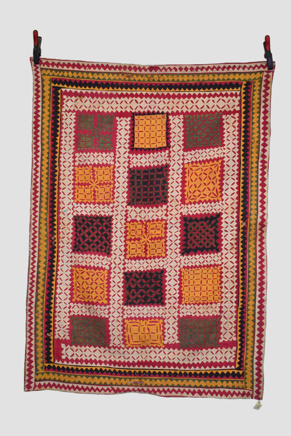 Two Indian cotton quilts, first half 20th century, the first, 64in. X 47in. 163cm. X 119cm.