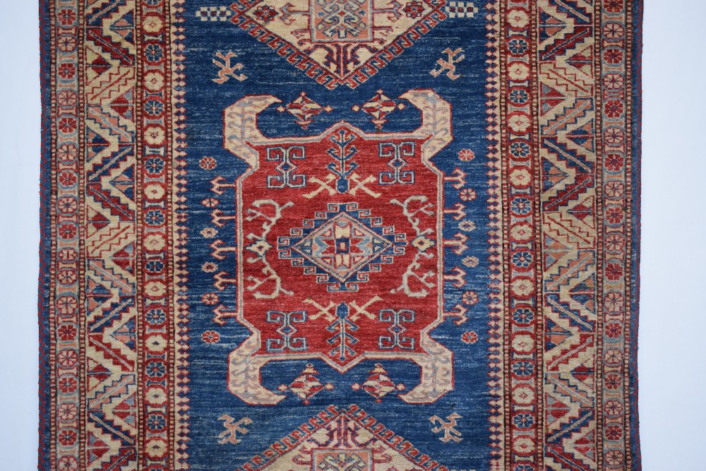 Chobi rug of Caucasian design, Afghanistan, late 20th century, 5ft. 11in. X 4ft. 3in. 1.80m. X 1. - Image 3 of 8