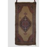 Ushak rug, west Anatolia, circa 1930s, 5ft. 11in. X 2ft. 11in. 1.80m. X 0.89m. Few surface marks.