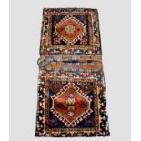 Qashqa'i double khorjin, Fars, south west Persia, circa 1900, 3ft. 9in. X 1ft. 8in. 1.14m. X 0.