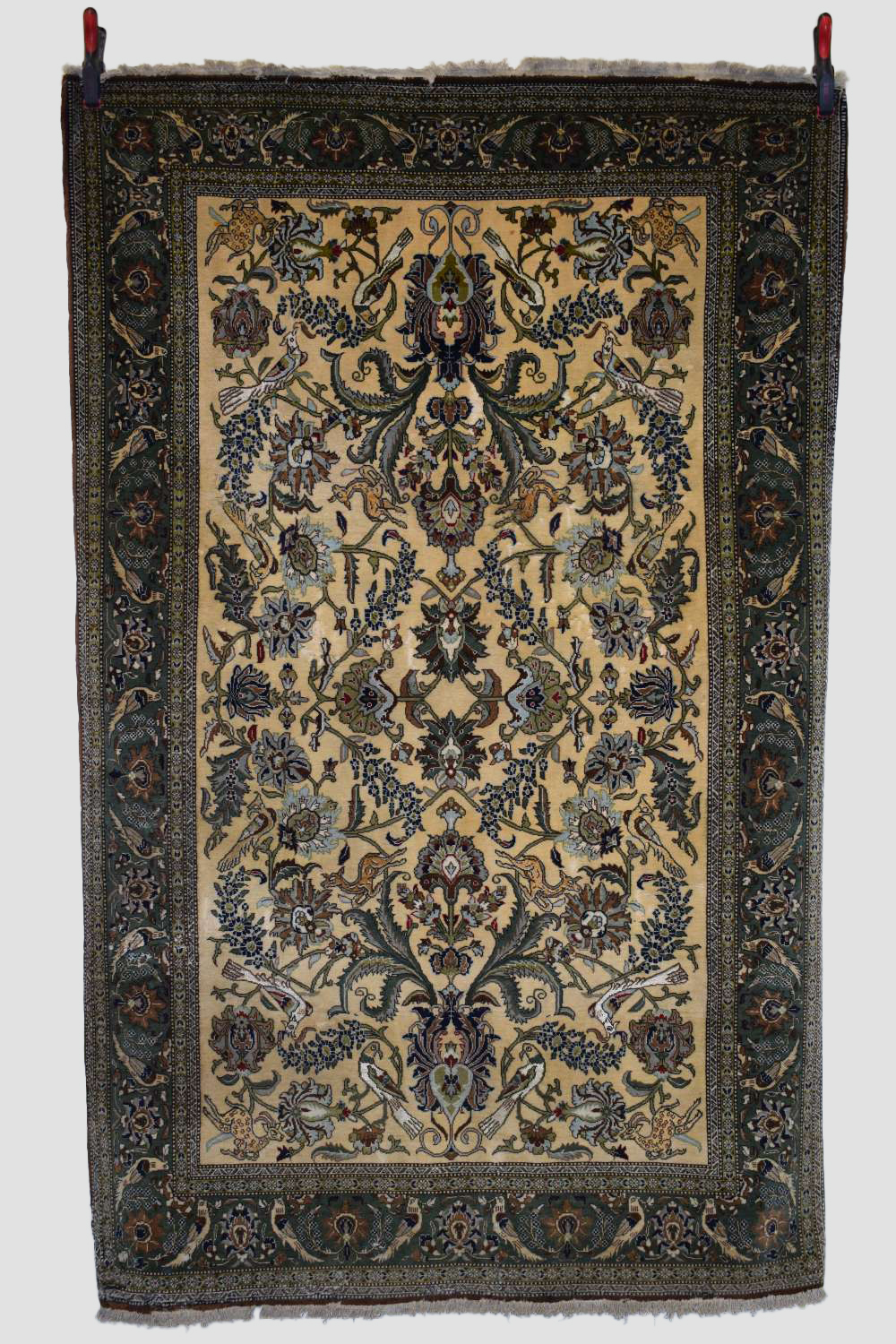 Qum part silk rug, south central Persia, mid-20th century, 6ft. 11in. X 4ft. 5in. 2.11m. X 1.35m.