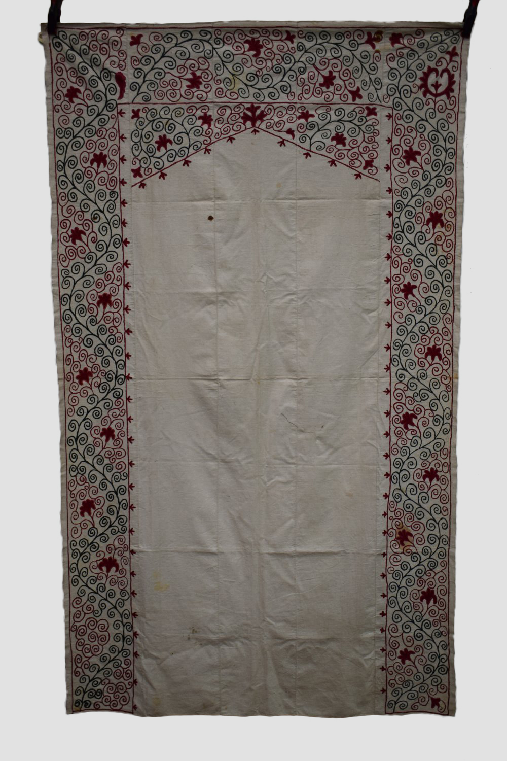 Two Uzbek suzani joinamoz (prayer cloths), Afghanistan, the first, mid-20th century, 94in. X 54in.