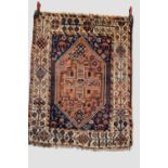 Khamseh rug, Fars, south west Persia, circa 1920s-30s, 4ft. 5in. X 3ft. 7in. 1.35m. X 1.09m. Dark