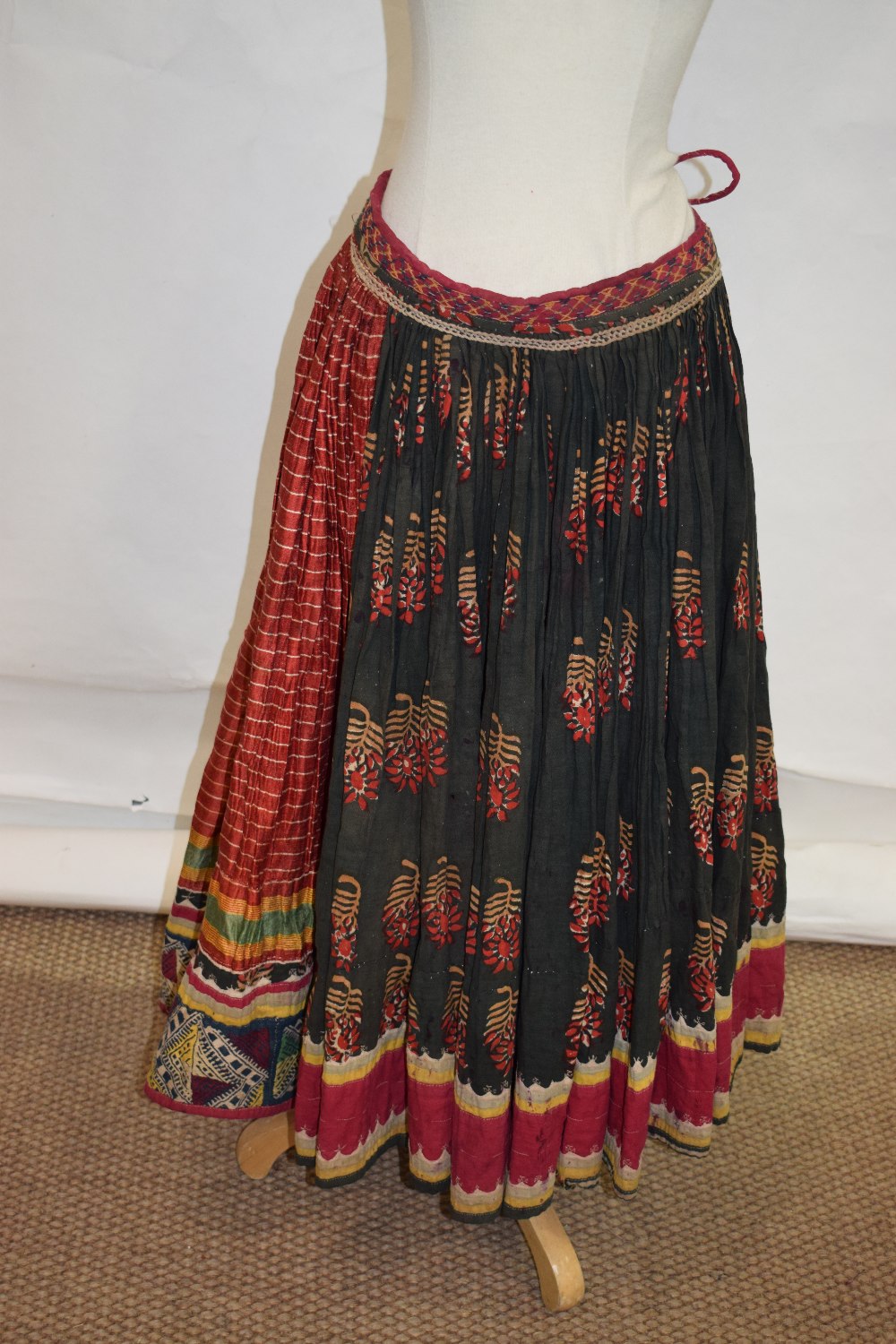 Banjara woman's mashru silk skirt, north west India, circa 1950s, embroidered rouleau waistband; - Image 2 of 5