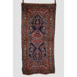 Hamadan rug, north west Persia, circa 1930s-40s, 7ft. 8in. X 3ft. 7in. 2.34m. X 1.09m. 'Bite' to