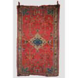 Ushak rug, west Anatolia, early 20th century, 6ft. 9in. X 4ft. 2.05m. X 1.22m. Overall wear with