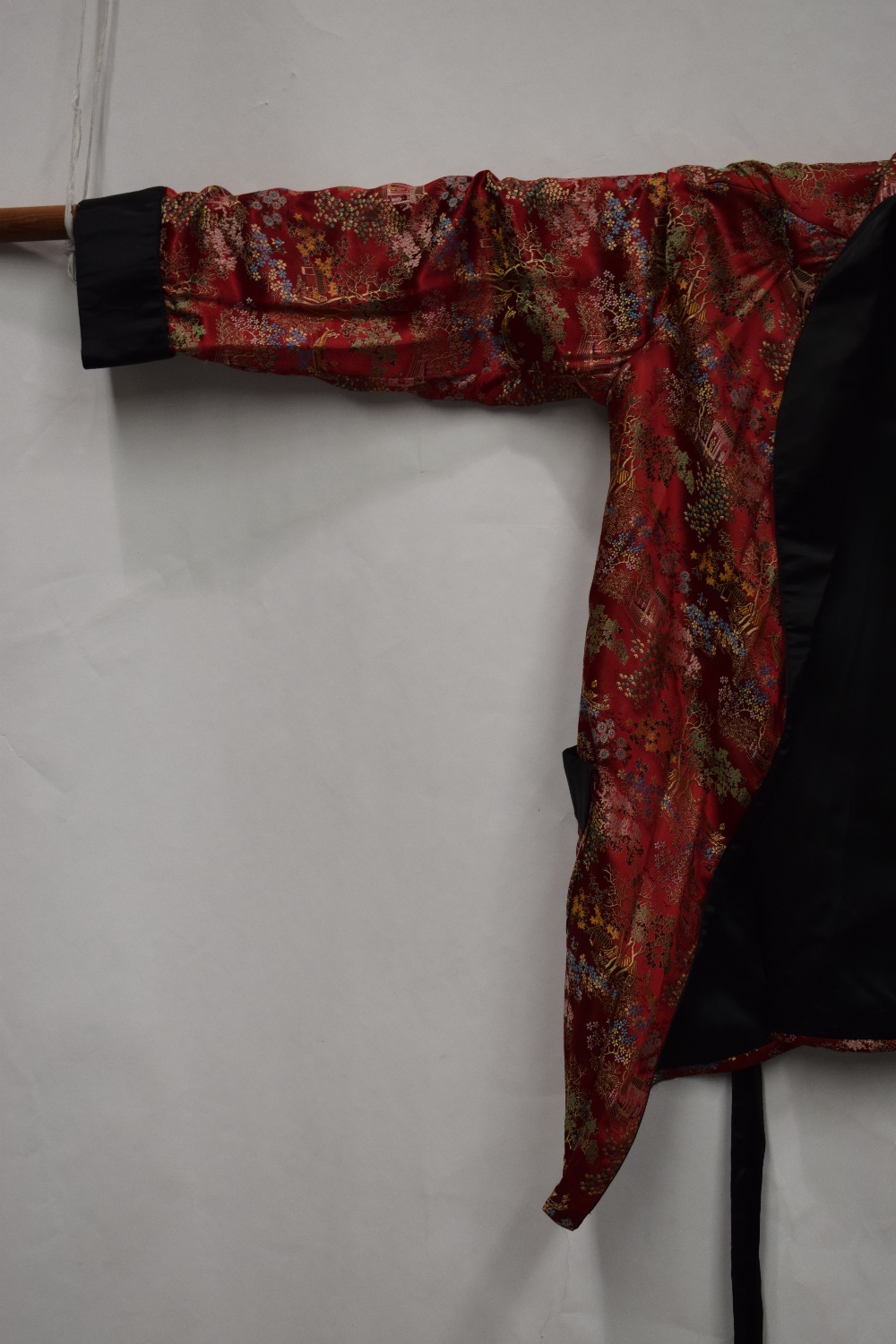 Two Chinese silk brocade jackets, second half 20th century, one red silk with black satin collar, - Image 16 of 22