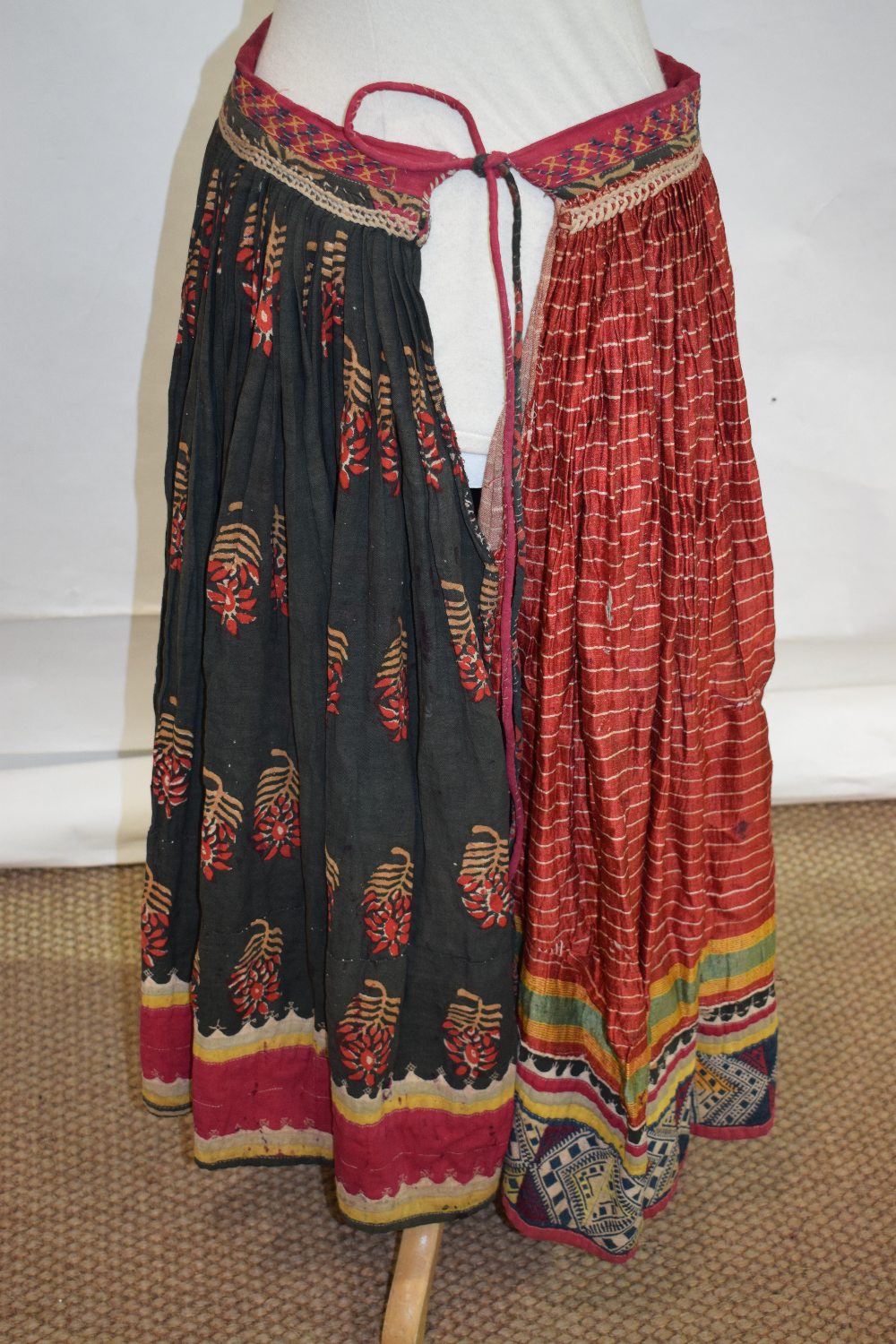 Banjara woman's mashru silk skirt, north west India, circa 1950s, embroidered rouleau waistband; - Image 5 of 5