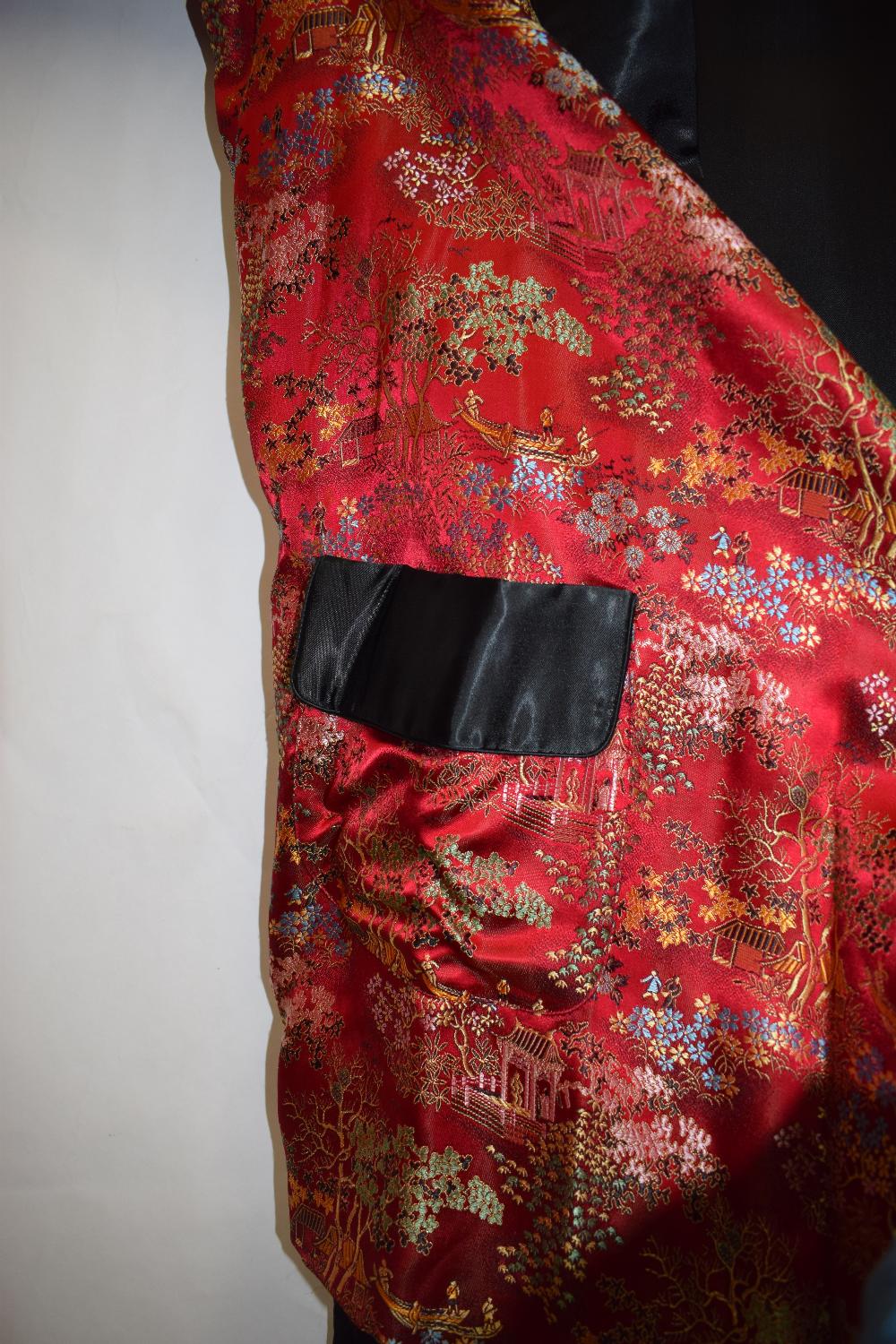 Two Chinese silk brocade jackets, second half 20th century, one red silk with black satin collar, - Image 18 of 22