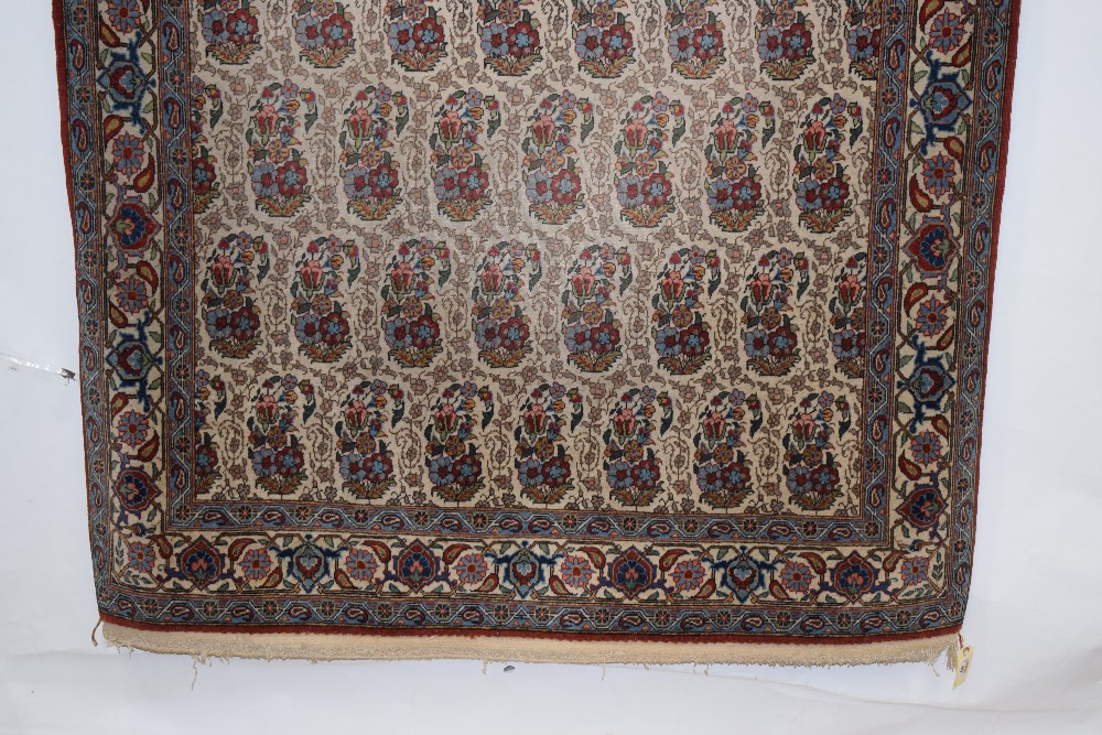 Qum 'boteh' rug, south central Persia, circa 1950s, 7ft. 2in. X 4ft. 5in. 2.18m. X 1.35m. Some - Image 6 of 8