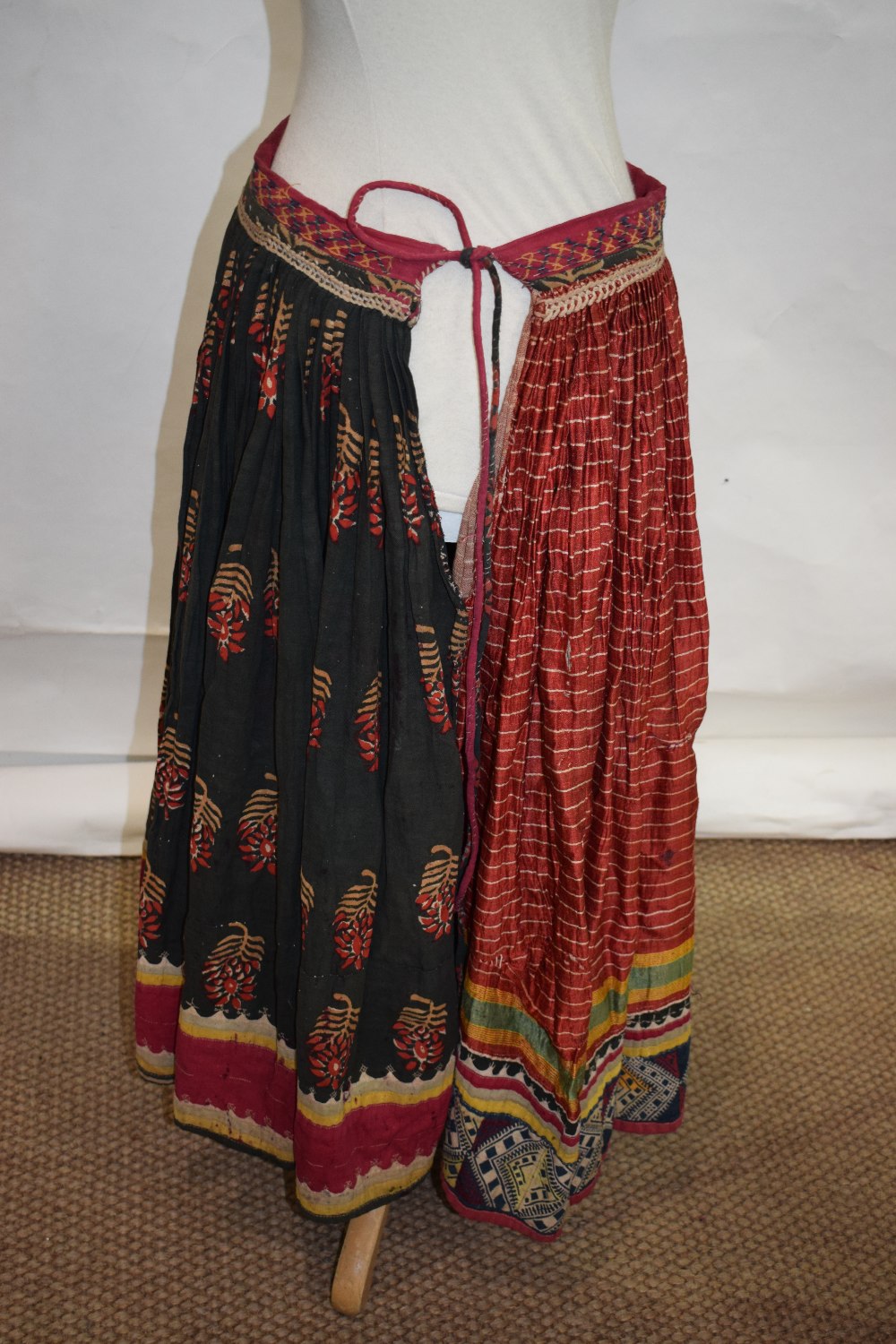 Banjara woman's mashru silk skirt, north west India, circa 1950s, embroidered rouleau waistband; - Image 4 of 5