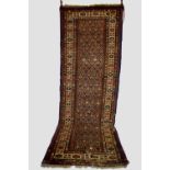 Kuba long rug, Shirvan district, north east Caucasus, late 19th century, 12ft. X 4ft. 2in. 3.66m.