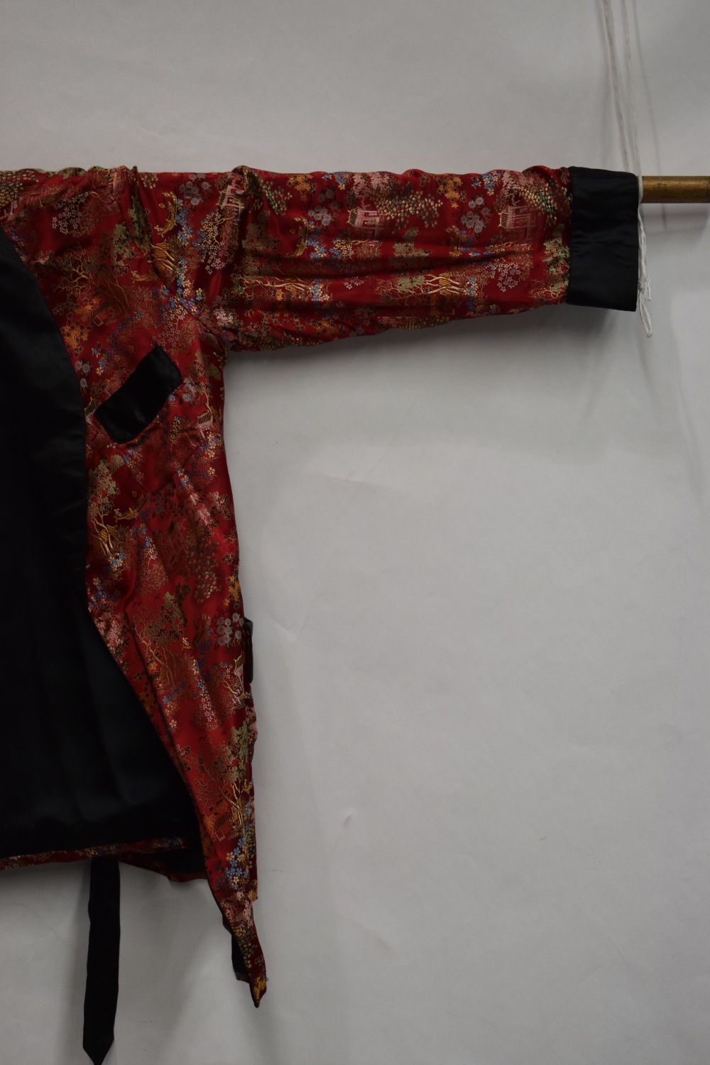 Two Chinese silk brocade jackets, second half 20th century, one red silk with black satin collar, - Image 15 of 22