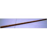 An early nineteenth century Dandy's Malacca cane, the gold top engraved a crest and initials, 34.5in