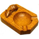 A Mouseman of Kilburn oak ashtray, carved with a mouse, circa 1950, 4in (10cm)