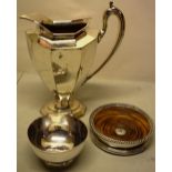 An American electroplated water jug by Reed and Barton, with an oval panelled body and foot, a