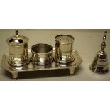 A Ferdinand VII Spanish silver inkstand, fitted a central sealing wax box with a hand bell, an