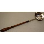 A George III silver 'goose egg' bowl punch ladle, with a turned wood handle, makers mark indistinct,