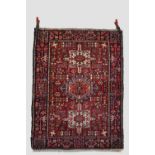 Karaja rug, north west Persia, circa 1930s, 4ft. 7in. X 3ft. 5in. 1.40m. X 1.04m. Small spots of old