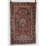 Kashan prayer rug, west Persia, circa 1930s, 6ft. 11in. X 4ft. 5in. 2.11m. X 1.35m. Soft red