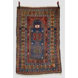 Kazak prayer rug, south west Caucasus, early 20th century, 5ft. 3in. X 3ft. 7in. 1.60m. X 1.09m.