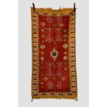 Tazenakht rug, south east Morocco, circa 1950s, 5ft. 11in. X 3ft. 1in. 1.80m. X 0.94m. Light red