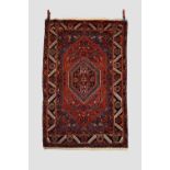 North west Persian rug, Heriz area, circa 1940s, 5ft. 7in. X 3ft. 7in. 1.70m. X 1.09m. Some wear