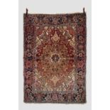 Heriz rug, north west Persia, circa 1940s, 6ft. 5in. X 4ft. 10in. 1.96m. X 1.47m. Earthy-red