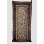 Kurdish long rug, north west Persia, early 20th century, 9ft. 2in. X 4ft. 2.80m. X 1.22m. Overall