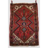 Three north west Persian rugs; the first Karaja, circa 1930s, 6ft. 3in. X 4ft. 9in. 1.91m. X 1.
