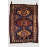 Karaja rug, north west Persia, circa 1930s, 5ft. 2in. X 3ft. 11in. 1.58m. X 1.20m. Some wear in