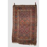 Two Persian rugs: the first, Kurdish rug, north west Persia, circa 1920s-30s, 6ft. 7in. X 4ft. 2.