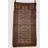 Baluchi prayer rug, Khorasan, north east Persia, early 20th century, 5ft. 5in. X 2ft. 11in. 1.65m. X