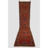 Good Hamadan runner, north west Persia, circa 1930s, 17ft. 6in. X 3ft. 6in. 5.34m. X 1.07m. Soft