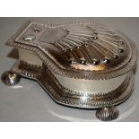 An Edwardian silver copy of a James 1st spice box, the hinged lid with a repousse scallop shell, the
